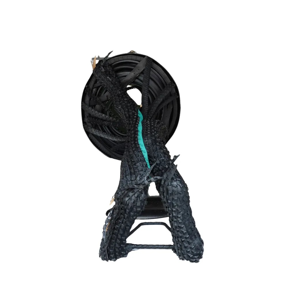 MAKP-024d, Ade, Marcel Kpoho, 2026, Assembly of tire strips and mixed media, 90x75x55 cm.webp